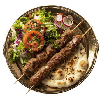 Delicious Seekh Kebab with Naan and Fresh Salad on Plate png
