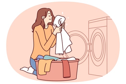 Housewife woman sits near washing machine and inhales fragrant smell of freshly washed towel vector
