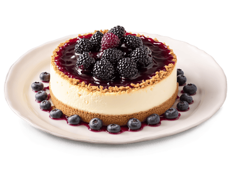 Cheesecake Creamy cheesecake with graham cracker crust and mixed berry compote png
