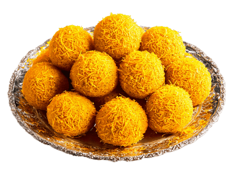 Laddu with Saffron Strands Round laddus adorned with saffron strands served on a glass platter png