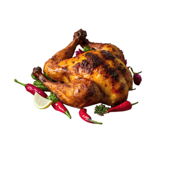 Delicious roasted chicken garnished with greens, red chilis, lime wedge, perfect for culinary presentations and food photography. png