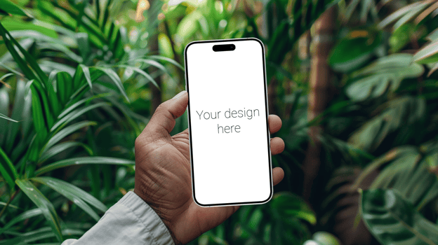 Mockup of white smartphone in person's hand Plants on background psd