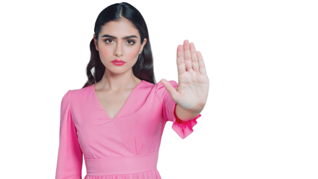 Young Woman in Pink Dress Making Stop Gesture With Open Hand png