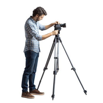 Man setting up a camera on a tripod, preparing for a photo or shoot png