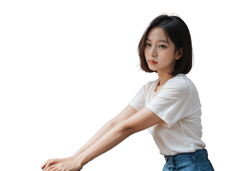A woman in a white t-shirt and denim bottoms sits casually, representing a comfortable yet stylish everyday look. png
