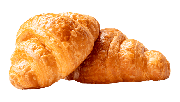 Side view of brown croissants in stack isolated in file format png