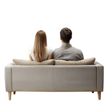 Young Couple Sitting Together on a Comfortable Couch in a Modern Living Room png