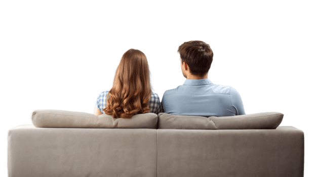 A young couple sitting on a sofa spending quality time in a comfortable living room setting on a transparent background png