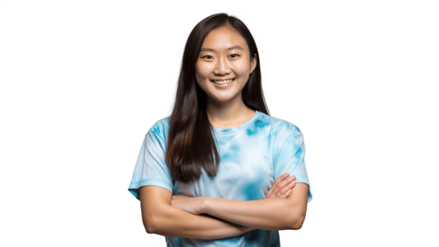Young Woman Smiling With Arms Crossed In Casual Blue Tie-Dye Shirt on a Transparent Background png