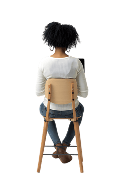 woman sitting on a chair and using a laptop, isolated against a transparent background png
