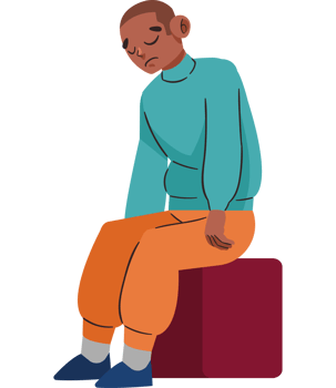 A man sitting on a box with his head down png