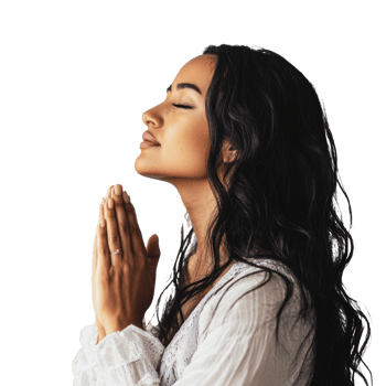 Woman praying with a peaceful expression indoors png