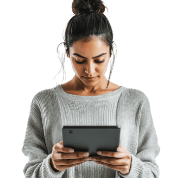 Woman in sweater using tablet indoors png