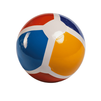 Colorful beach ball resting on a surface during a sunny day at the park png