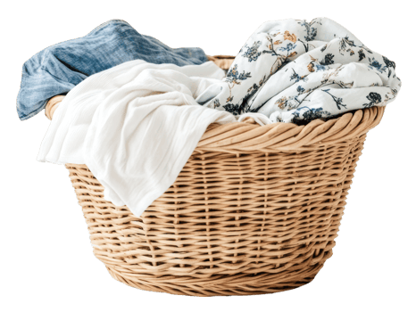 Woven laundry basket filled with clean clothes, cut out - stock . png