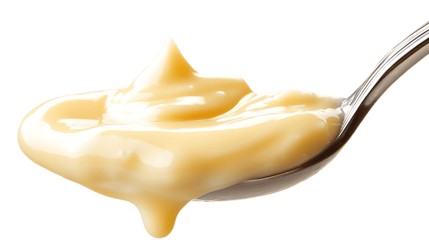 Creamy Custard Dripping from a Spoon on a Transparent Background png