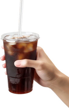 hand holding a plastic cup with cola and straw png