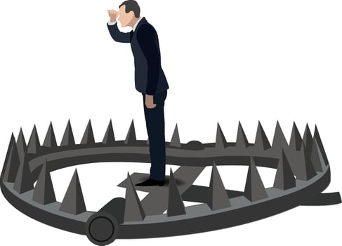 Businessman looking away unaware of bear trap danger vector