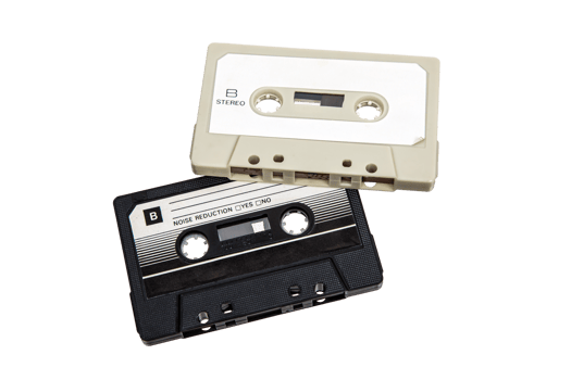Close-up of an audio cassettes with a sticker without text. Analog storage medium. Cassettes for audio recordings and music. png