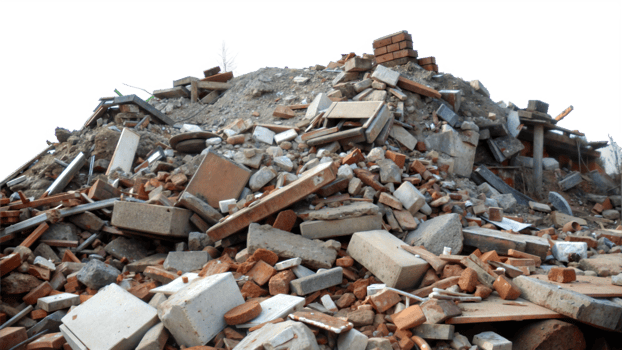 Pile of rubble and debris from a demolished building, symbolizing destruction png