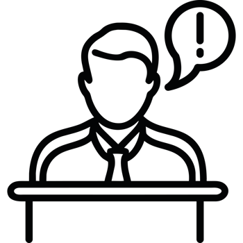 A man is sitting at a desk with a speech bubble png