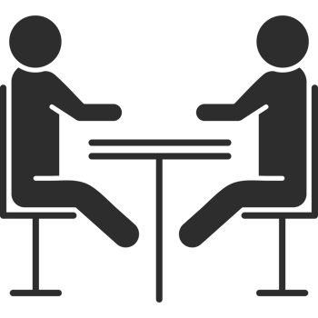 Two people sitting at a table with a chair png