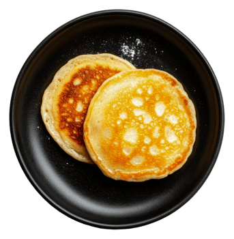 Fluffy pancakes on a black plate png