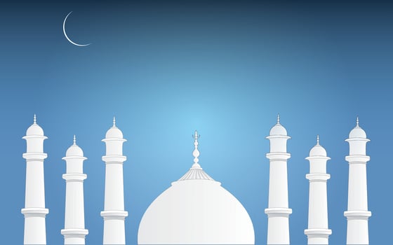 Eid greetings after the month of Ramadan for Muslim world using white masjid on blue background vector
