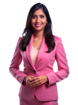 Professional woman in a pink suit smiles confidently while standing against a white background, transparent png
