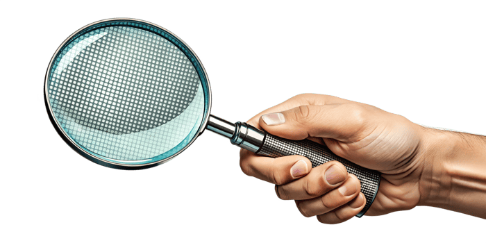 Hand holding a magnifying glass against, cut out transparent png