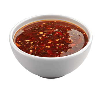 Bowl of Red Soup with Visible Seasoning Pieces on Transparent background png