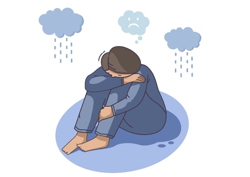 Unhappy young boy sits hugging his knees. Alone. Sad. Depressed man. vector