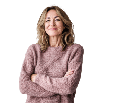A confident woman smiles while standing with crossed arms indoors, transparent png