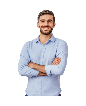 Smiling man in a light blue shirt poses confidently in studio setting, transparent png
