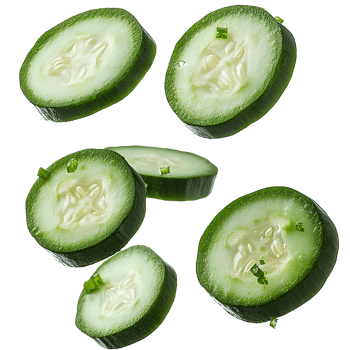 Falling cucumber pieces . Cucumber slices falling from the top for organic vegetable campaign full of vitamins. Cucumber slices flying . Cucumber pieces falling isolated png