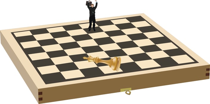 Businessman celebrating victory on chessboard with fallen king vector