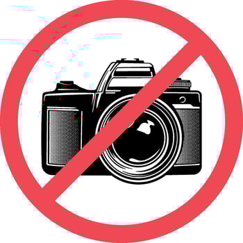 camera in a red crossed out circle vector