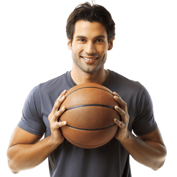 Man holding a basketball, smiling with confidence png