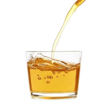 Golden liquid pouring into a clear glass with ice isolated transparent png