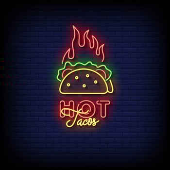 hot tacos neon sign with brick wall background vector