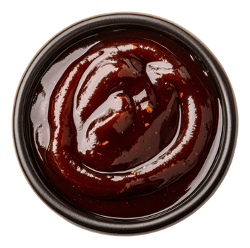 Rich and thick barbecue sauce in a black bowl png