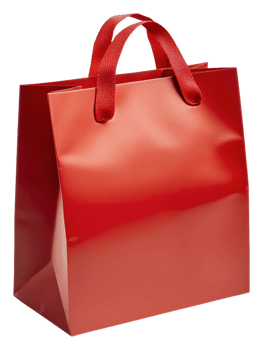 Bright red shopping bag resting on a flat surface, cut out - stock . png