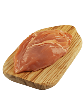 A raw chicken breast on a wooden cutting board png