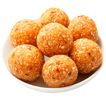 Delicious Sweet Balls with Sesame Seeds on a Plate png