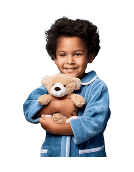 A young boy in a blue robe holding a teddy bear png
