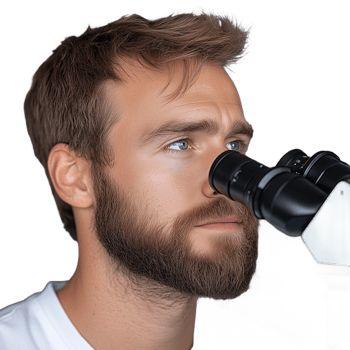 Young bearded scientist using microscope for research on a transparent background. Focused expression indicates concentration and dedication to scientific study and discovery. png