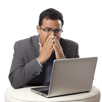 A man sitting in front of a laptop png