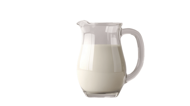 A clear pitcher brimming with fresh, creamy milk showcases its smooth texture and inviting color. png