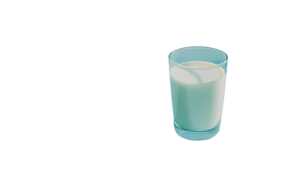 A glass filled with fresh milk sits on a light surface, exuding a sense of simplicity and purity. png