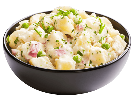 Potato salad with peas and herbs in a black bowl png